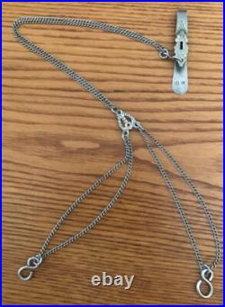 ANCIENNE CHATELAINE CLAVET EN ARGENT MASSIF. 3 chaînes. Poinçons minerve/maître