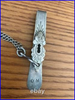 ANCIENNE CHATELAINE CLAVET EN ARGENT MASSIF. 3 chaînes. Poinçons minerve/maître