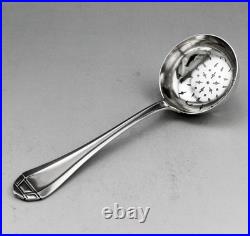 Ancienne Cuillère Saupoudreuse ou passe thé en argent massif poinçon 1er titre