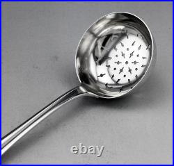 Ancienne Cuillère Saupoudreuse ou passe thé en argent massif poinçon 1er titre