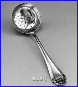 Ancienne Cuillère Saupoudreuse ou passe thé en argent massif poinçon 1er titre