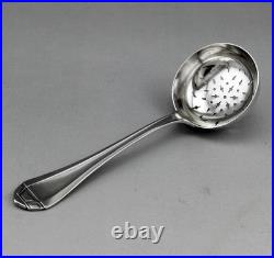 Ancienne Cuillère Saupoudreuse ou passe thé en argent massif poinçon 1er titre