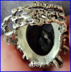 Bague naturaliste argent massif poinçon 925 avec grosse améthyste ovale taillée