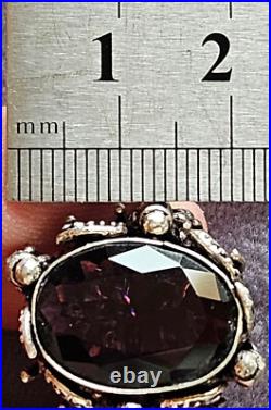 Bague naturaliste argent massif poinçon 925 avec grosse améthyste ovale taillée