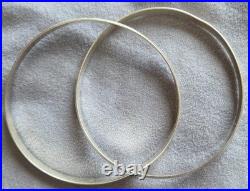 Bracelet double jonc enlacés en argent massif Poinçons Minerve & orfèvre