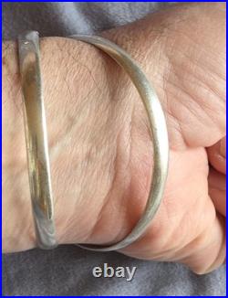 Bracelet double jonc enlacés en argent massif Poinçons Minerve & orfèvre