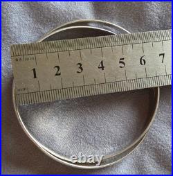 Bracelet double jonc enlacés en argent massif Poinçons Minerve & orfèvre