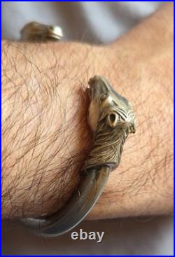 Bracelet vintage jonc ouvert à têtes de chevaux en argent massif Poinçons