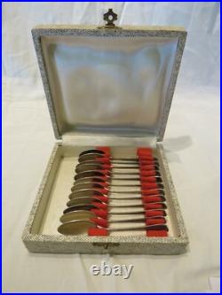 Coffret 12 Cuilleres A Moka En Argent Massif Travail Etranger Poincon 0.800 Coffret 12 Cuilleres A Moka En Argent Massif Travail Etranger Poincon 0.800