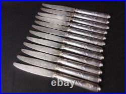Couteaux a fruits x 12 Argent massif (lame et manche) poinçon Minerve XIXème Couteaux a fruits x 12 Argent massif (lame et manche) poinçon Minerve XIXème