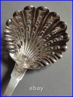 Cuillère Saupoudreuse en Argent ajouré, poinçon minerve 1er titre, Poids 37 g