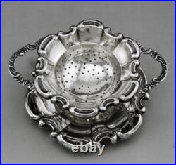 Jolie passe thé et son support en argent massif poinçon Allemand Allemagne