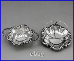 Jolie passe thé et son support en argent massif poinçon Allemand Allemagne