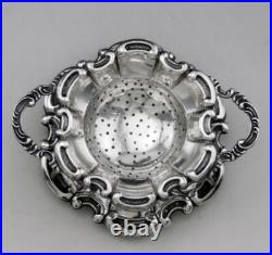 Jolie passe thé et son support en argent massif poinçon Allemand Allemagne