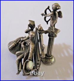 Les amoureux sur un banc et cupidon argent massif 46 gr poinçon