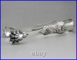 Magnifique Pince à sucre en argent massif poinçon minerve XIXe poids 71.6 G
