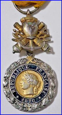 Médaille Militaire trophée biface en argent massif (poinçon tête de sanglier)