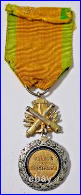 Médaille Militaire trophée biface en argent massif (poinçon tête de sanglier)