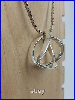 Moniquet France Pendentif argent 925 massif signé + poinçon style Mobius