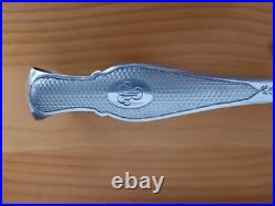 Pince a sucre griffes de lion en argent massif chiffrée AR, poinçon Minerve